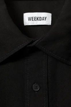 Weekday LOOSE SHORT SLEEVE DENIM SHIRT><noscript><img width=